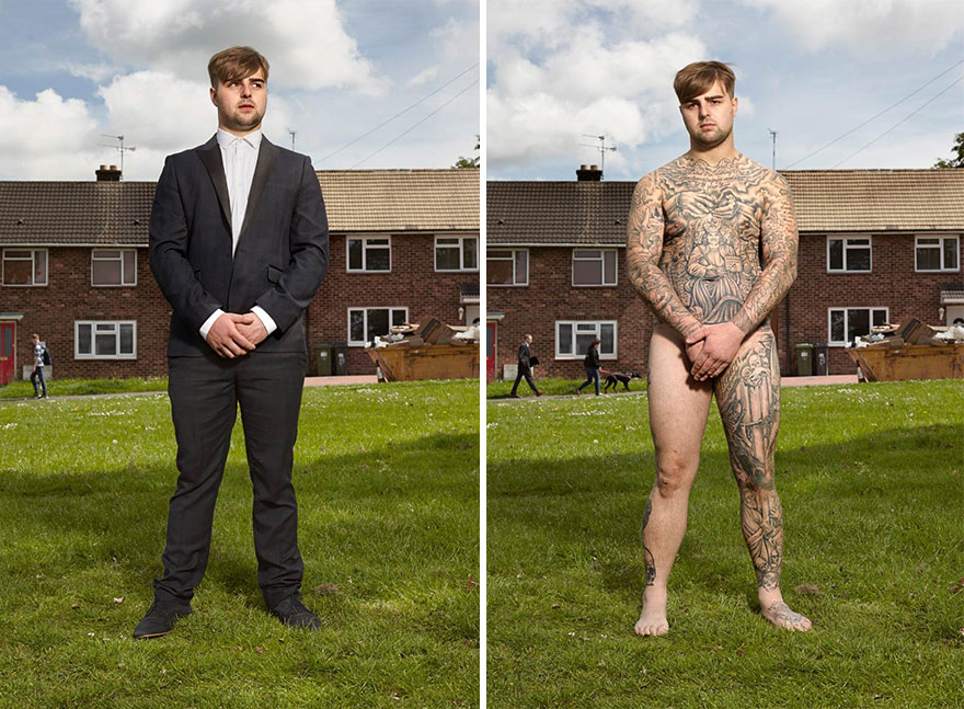 Tattooed man in suit and uncovered, revealing full body art in a suburban setting. Tattooed man in suit and uncovered, revealing full body art in a suburban setting.