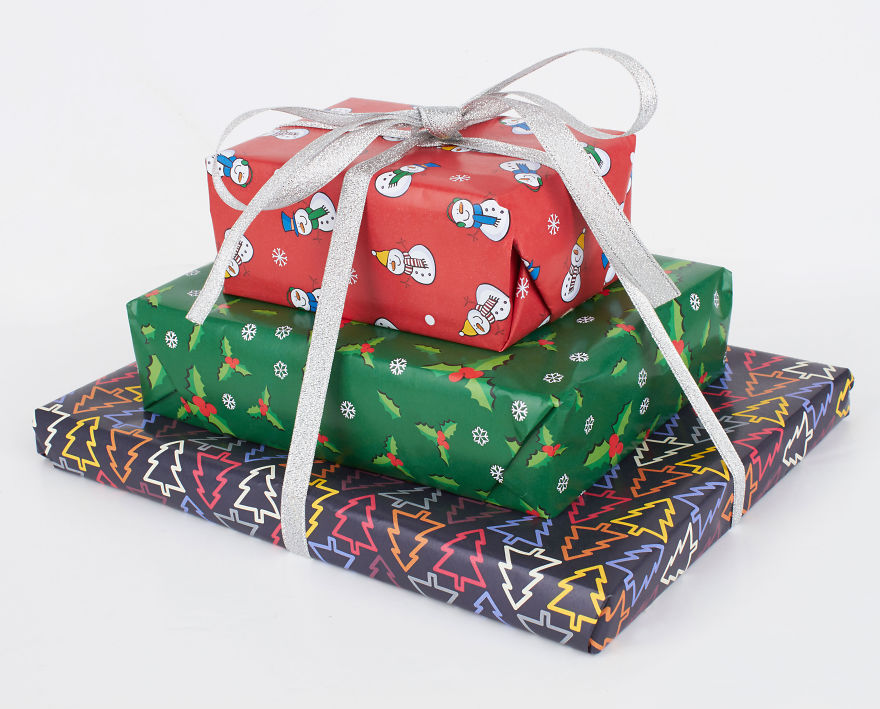 Company Turns Wrapping Paper Into Christmas Suits