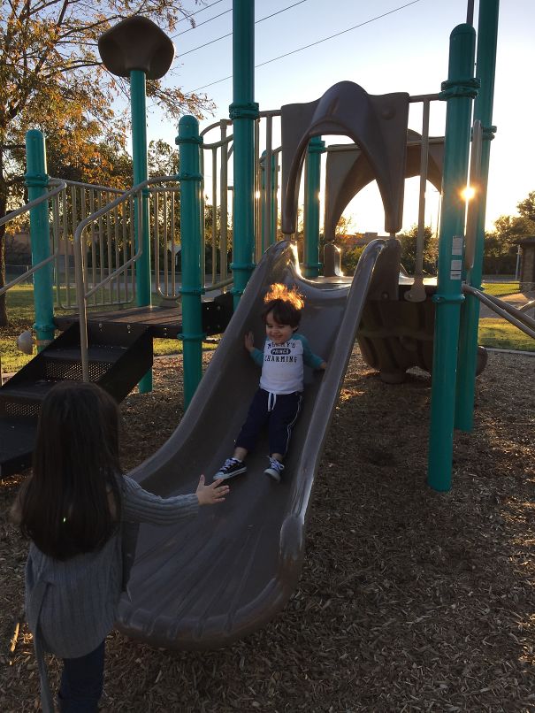 My 5yr Old Making Sure Her 2 Yr Old Brother Arrives Safely Down The Slide.