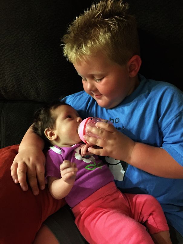 My Son Lovingly Feeding His Little Sister