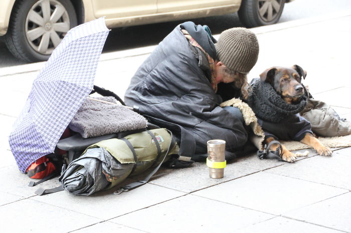 Homeless Woman And Her Dog In Berlin