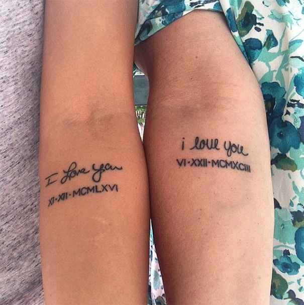 Mother-daughter tattoos with Roman numeral dates and "I love you" inscriptions, symbolizing their bond.