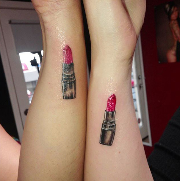 Mother-daughter tattoos featuring matching lipstick designs symbolize their unbreakable bond.