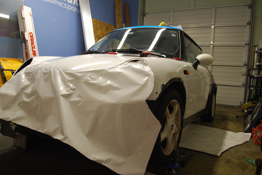 My Mini Cooper Became A Rolling Holiday Greeting After I Wrapped It In Christmas Paper