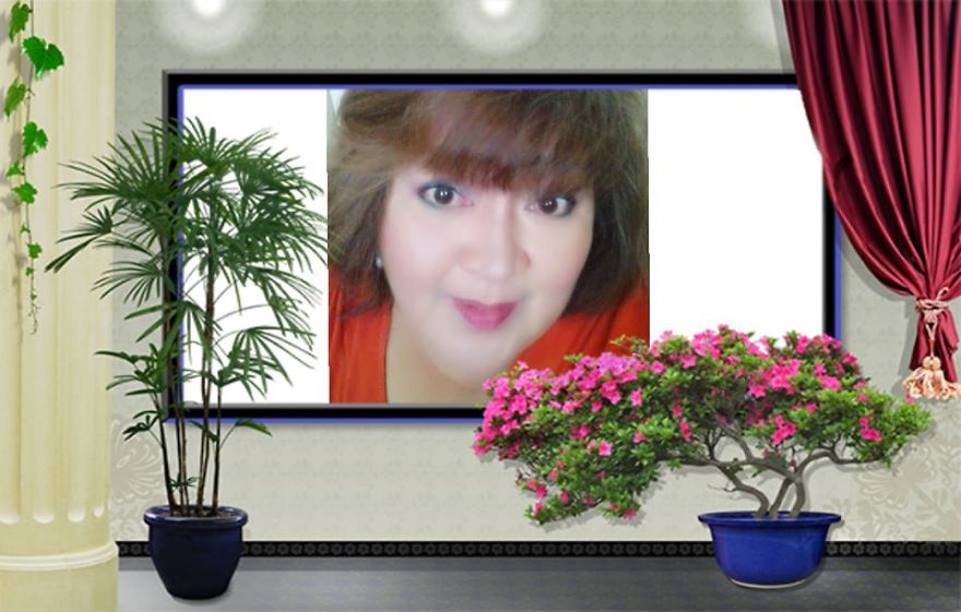 Portrait of a woman displayed in a room with plants, shot by a Romanian photographer to highlight global beauty.