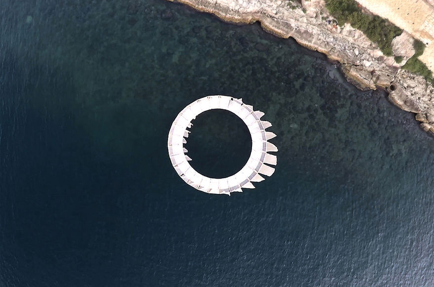 Self-Made Floating Island In Mediterranean Sea Makes You Feel Like In A New Isolated World Self-Made Floating Island In Mediterranean Sea Makes You Feel Like In A New Isolated World