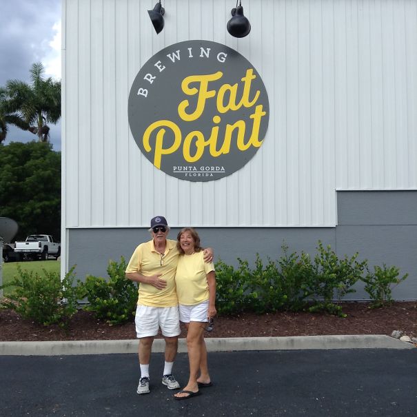Mom & Dad Dressed Alike (unplanned) And Matched Logo & Staff At New Brewery