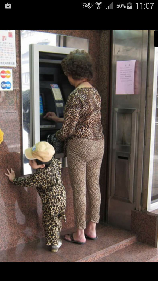 Cheetah Woman And Puma Boy Go To An Atm