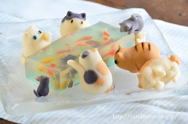 Candy Cats Trying To Catch Goldfish Stuck In Jelly