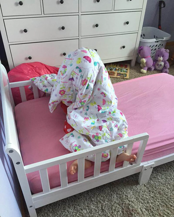 My 3 Year Old Daughter. Giggling Away From Her Awesome Hiding Spot