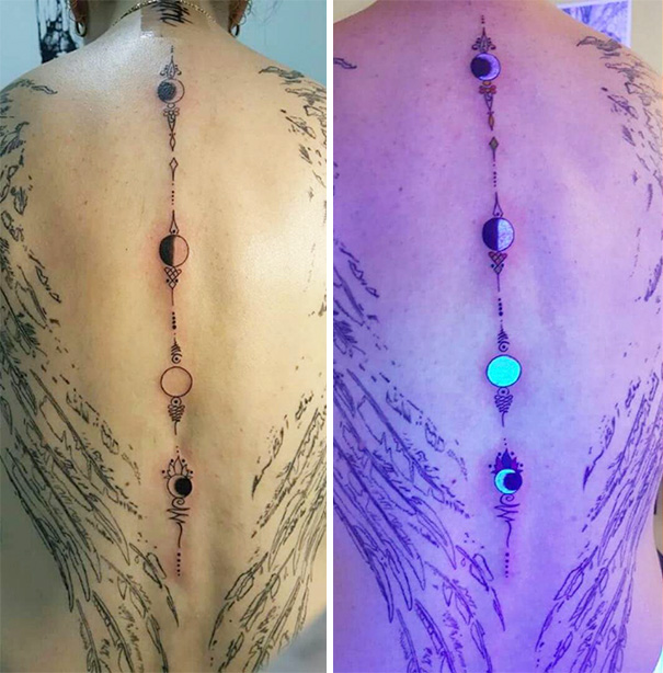 Glow in the dark tattoo on back, showing moon phases, visible under black light.