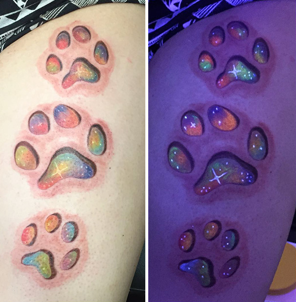 Paw print glow in the dark tattoos under black light.