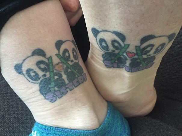 Two panda tattoos with the word "Sisters" on ankles, symbolizing sister bonds.