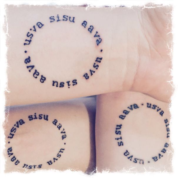 Circle tattoos with Finnish words symbolizing sisterly bond.
