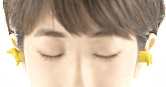 Dog-Shaped Earplugs That Look Like A Really Long Wiener Pup