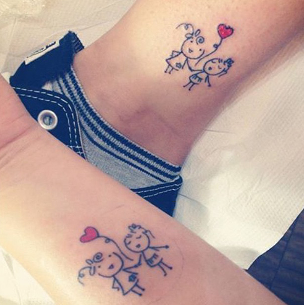 Stick figure sister tattoos with a red heart on wrists symbolizing their bond.