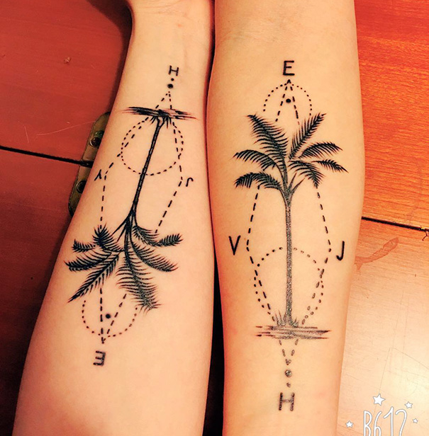 Matching sister tattoos featuring detailed trees with letters.