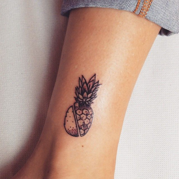 Minimalist pineapple tattoo on ankle, showcasing simple and inspiring ink design.