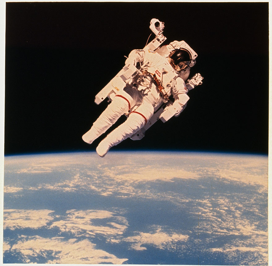Astronaut Bruce Mccandless Ii Floats A Few Meters Away From Space Shuttle Challenger During The Historic First Use Of A Nitrogen-propelled Manned Maneuvering Unit In 1984