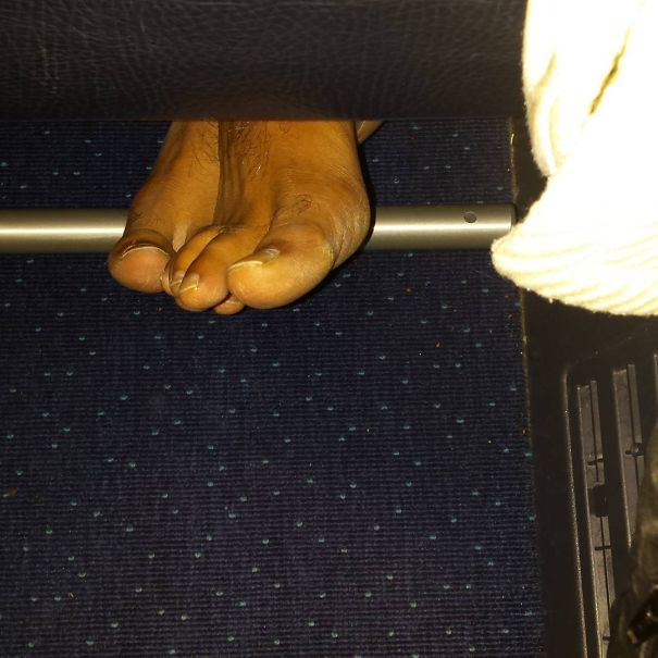 After An Hour And A Half Of Feeling What I Thought Was A Laptop Bag Brushing The Back Of My Boots, I Looked Down To See This Poking Out From Under My Seat