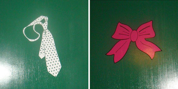 Bathroom signs with a polka dot tie and pink bow on green background.