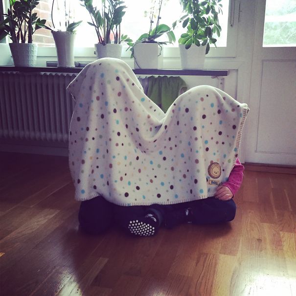 My Kids Hiding Under A Blanket In The Living Room.