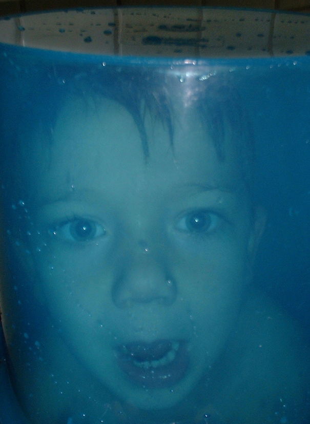 Help!!! He's Not Really Drowning. It's An Upside Down Bucket On His Head While Taking A Bath.