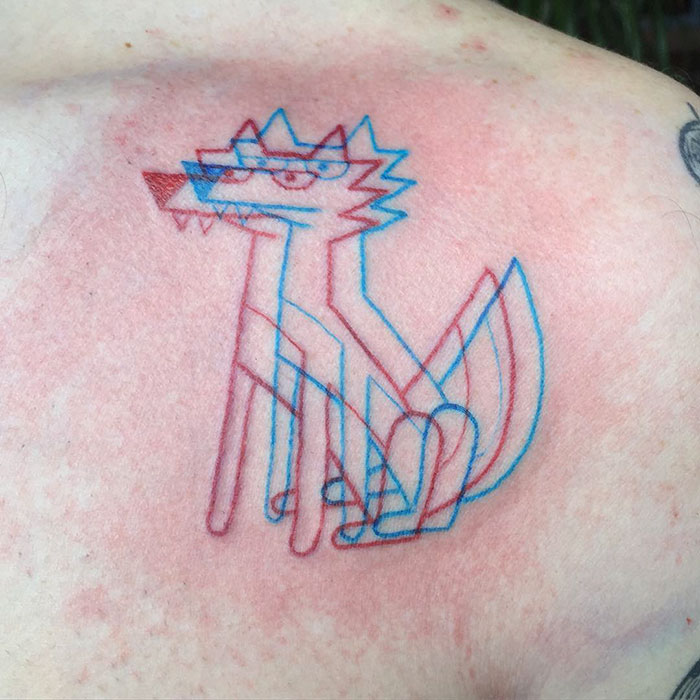 3D-inspired tattoo of an abstract geometric wolf in red and blue lines on skin.