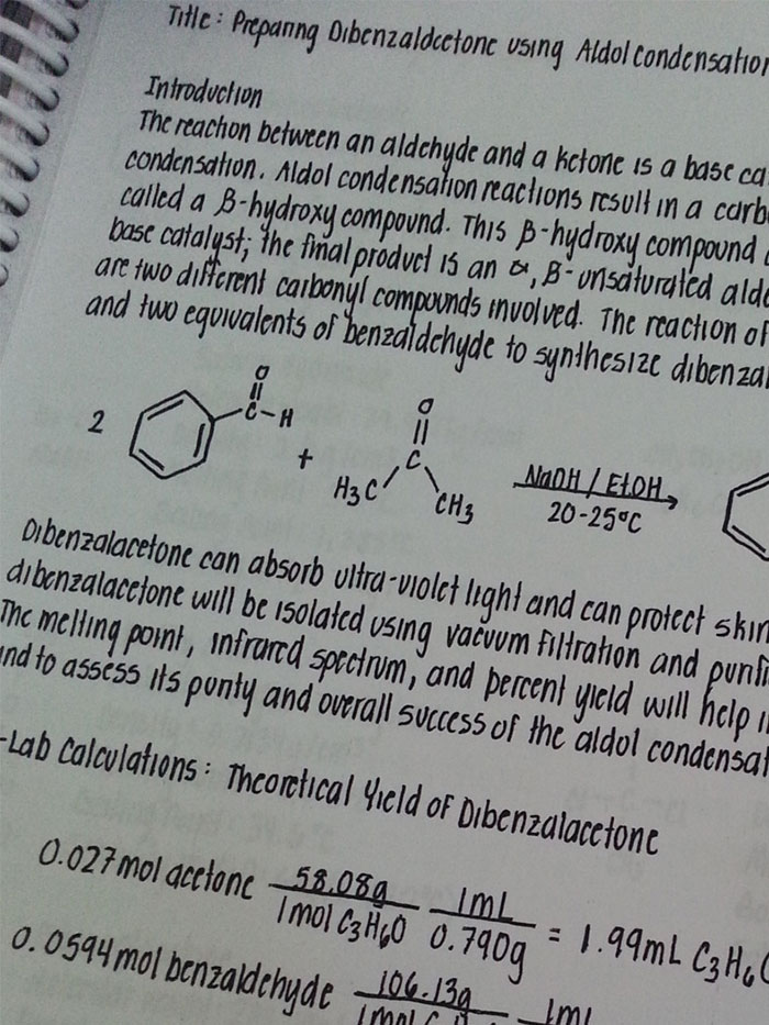 Beautiful handwriting example in a chemistry lab report detailing the synthesis of dibenzalacetone.