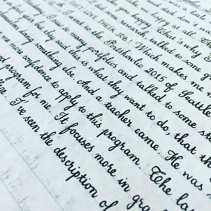 Beautiful handwriting example in neat black ink on ruled paper.