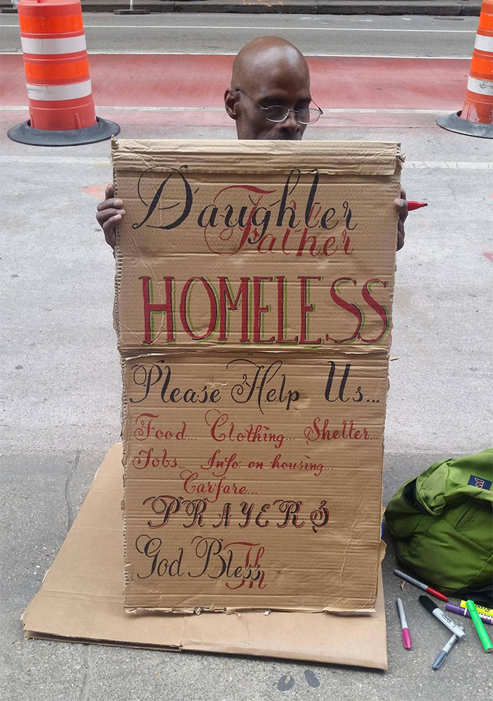 Handwriting example on a cardboard sign, using decorative fonts to convey a plea for help with "Homeless" highlighted.
