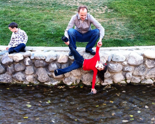 Our Daughter Really Wanted To Touch The Water But Couldn't Reach By Herself And This Was My Husband's Solution. Her Face Says It All