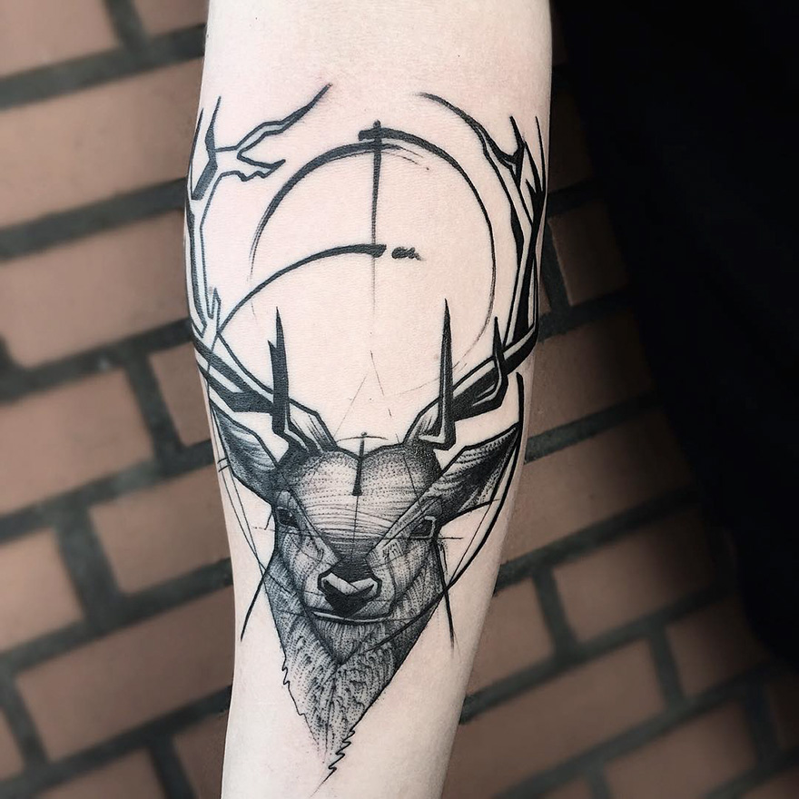 Sketch tattoo of a deer by Frank Carrilho, showcasing geometric lines and intricate detailing on a forearm.