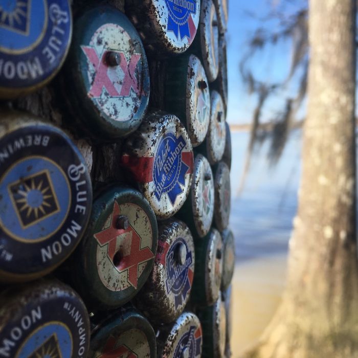 I Found Some Beer Caps Nailed To A Tree