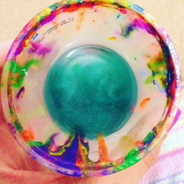 Cup Where Watercolors And Acrylic Paint Brushes Are Washed Off