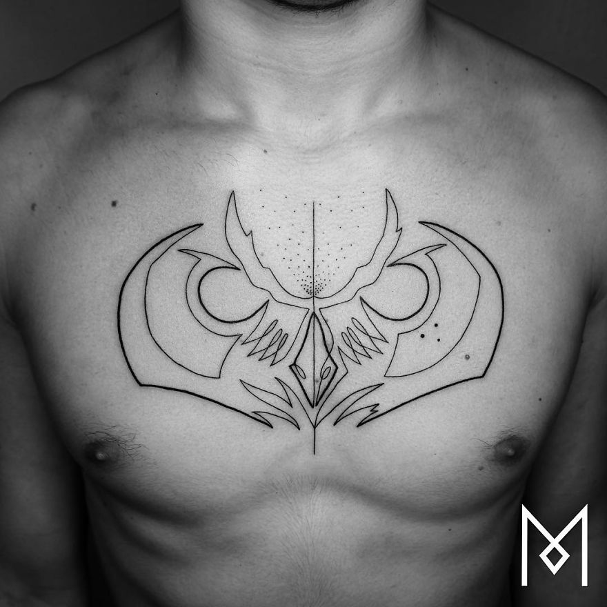 Chest with minimalist single line tattoo by Iranian-German artist, showcasing an abstract symmetrical design.