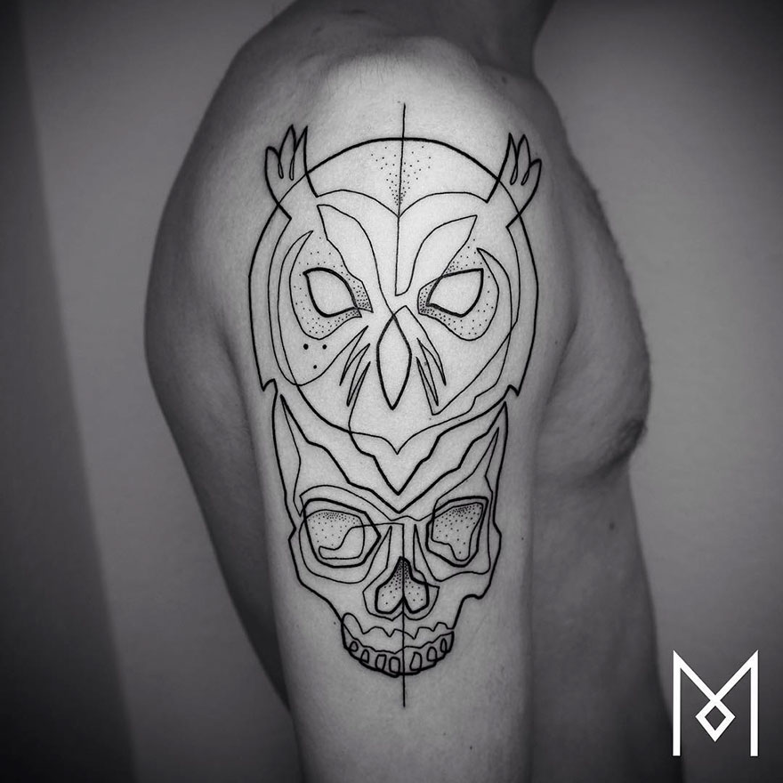 Minimalist single line tattoo on upper arm featuring an owl and skull design by Iranian-German artist.