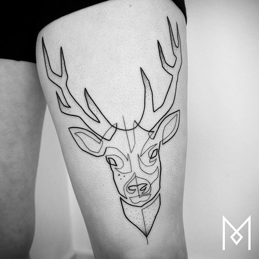 Minimalist single line deer tattoo on thigh by Iranian-German artist.