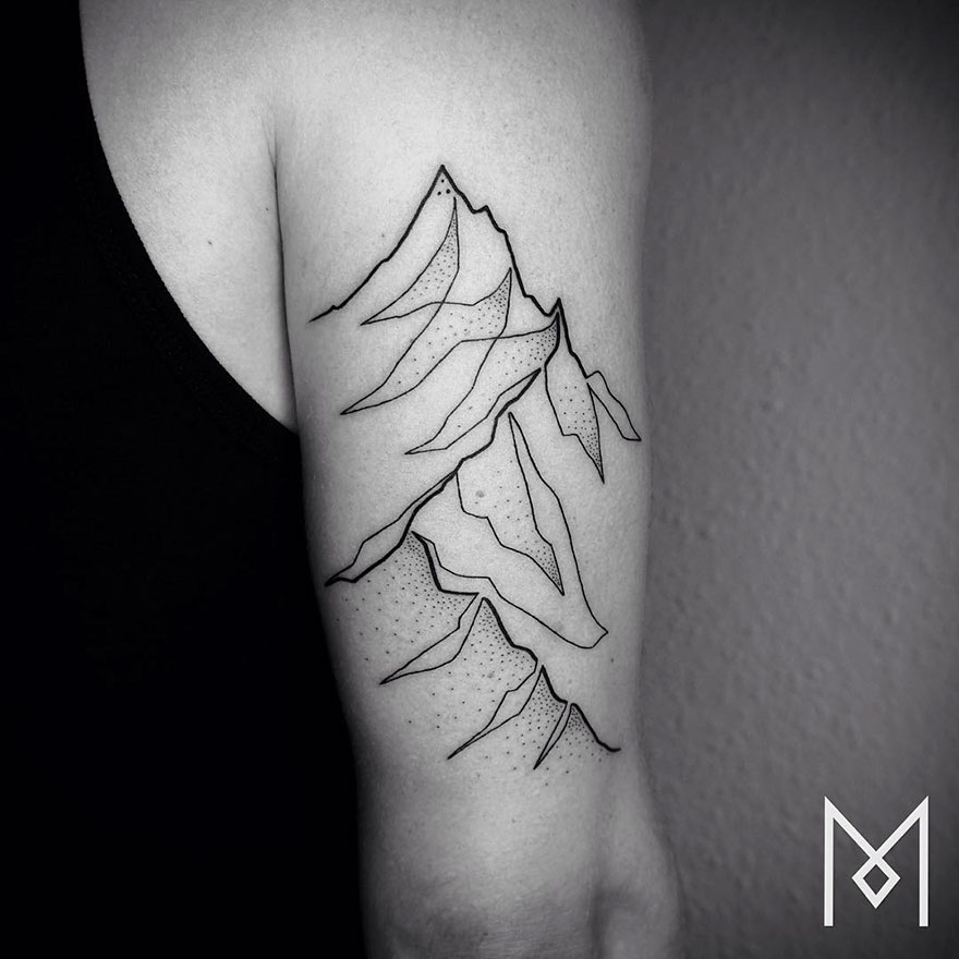 Minimalist single line tattoo on arm featuring abstract mountain design by Iranian-German artist.