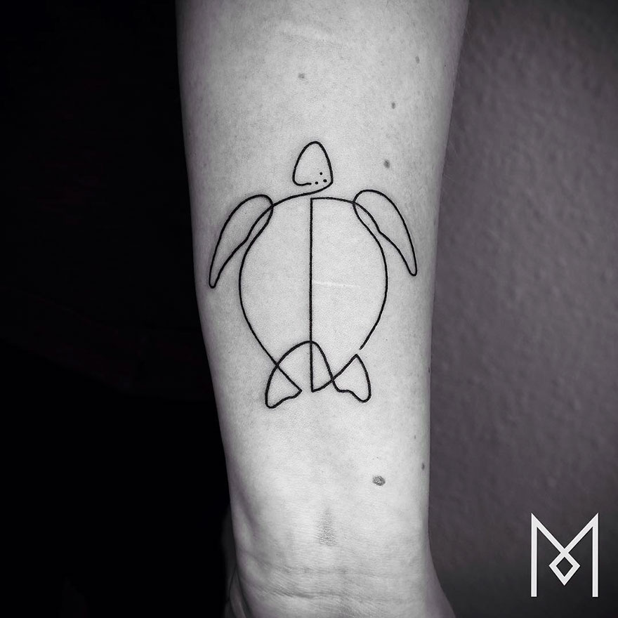 Minimalist single line tattoo of a turtle by Iranian-German artist, on a person's forearm.