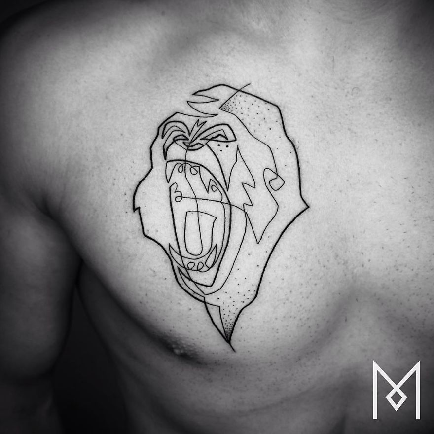 Minimalist single line tattoo of a roaring gorilla on a chest, by Iranian-German artist.