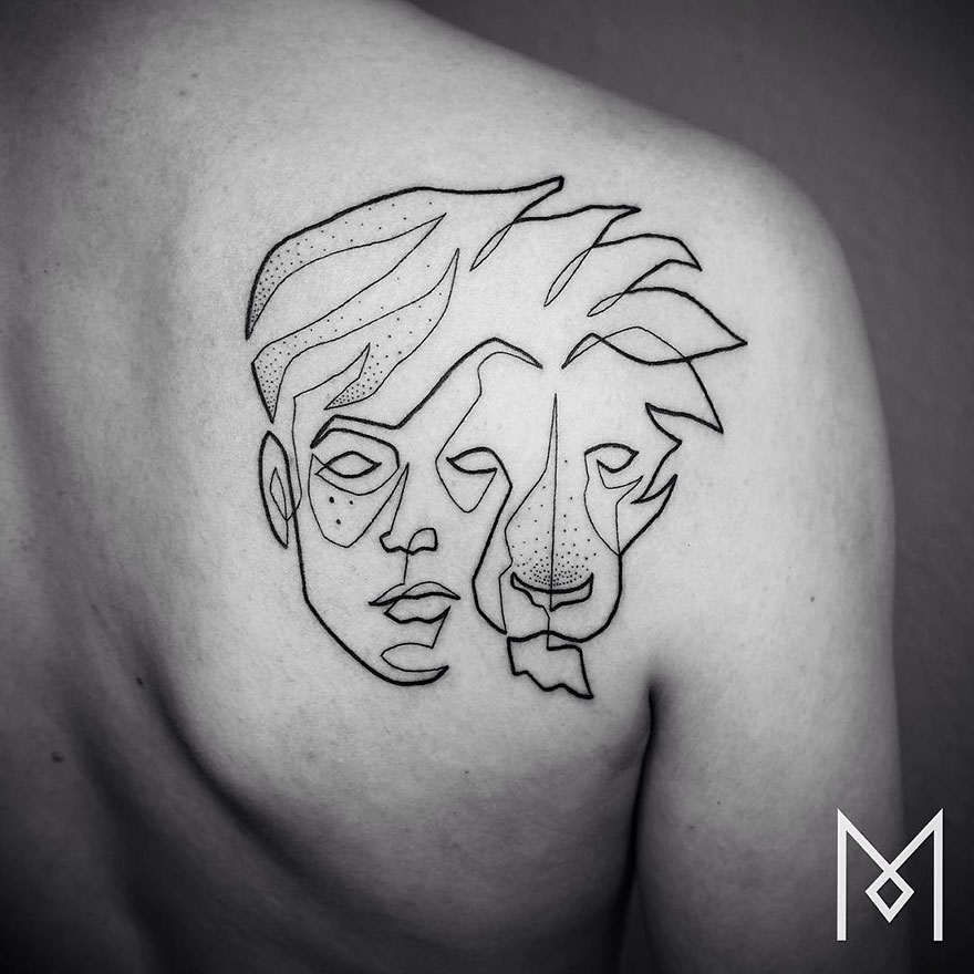 Minimalist single line tattoo of a human and lion face on shoulder.