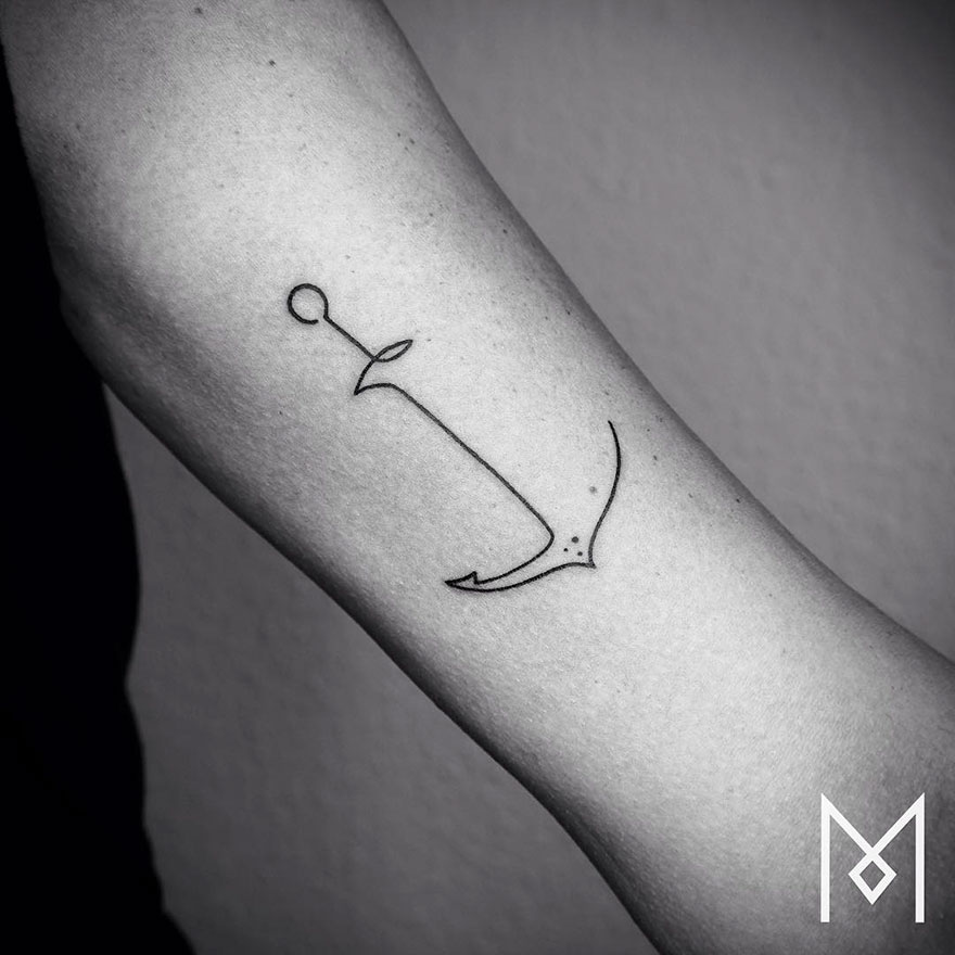 Minimalist single line tattoo of an anchor on an arm, designed by Iranian-German artist.