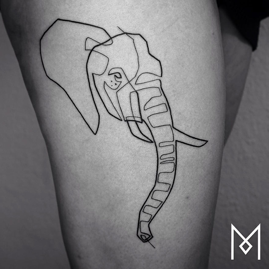 Minimalist single line elephant tattoo on skin by Iranian-German artist, showcasing intricate line work.