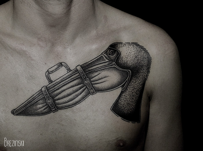 Surreal tattoo by a Belarussian artist on the chest, depicting a beaked mask with detailed shading.