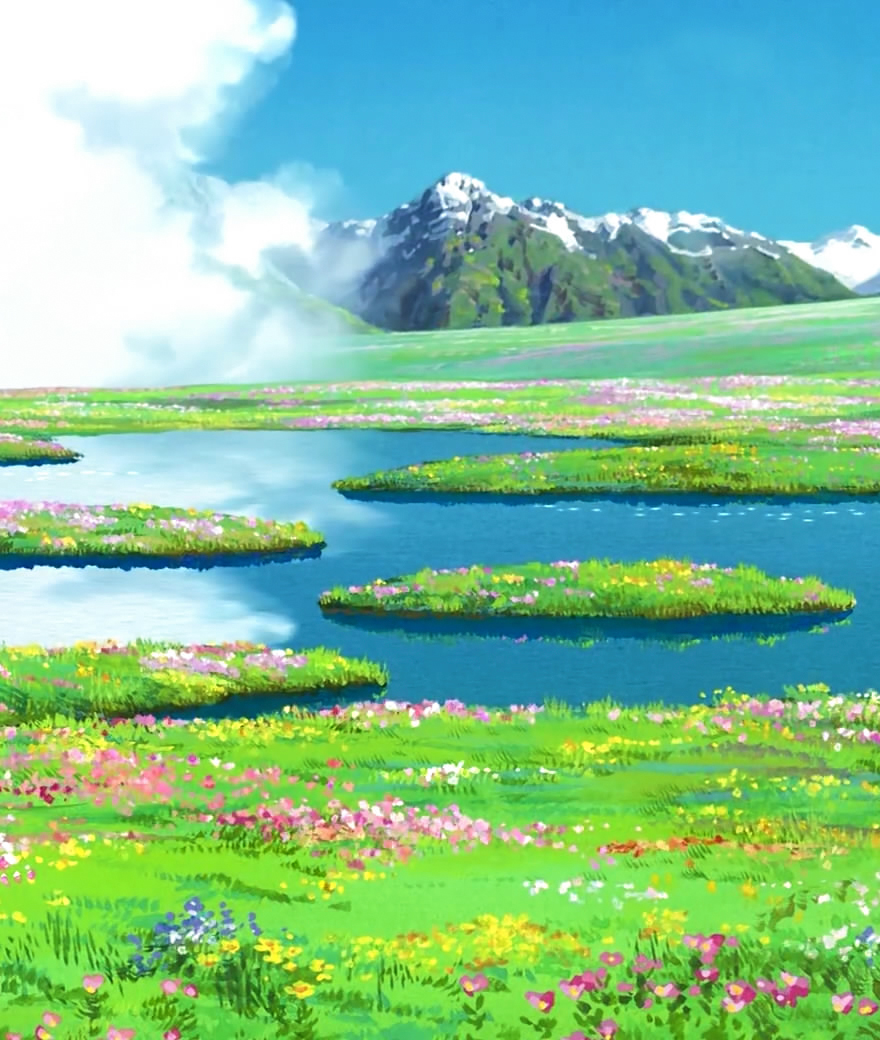 Studio Ghibli scenic landscape with mountains, lake, and blooming flower fields.
