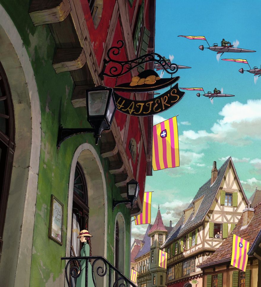 Studio Ghibli scene with colorful European-style buildings and aircraft in the sky.
