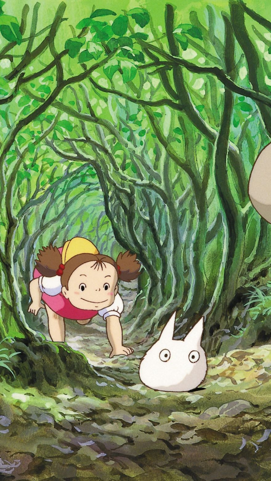 Studio Ghibli character in a lush green forest tunnel, accompanied by a small, white creature.