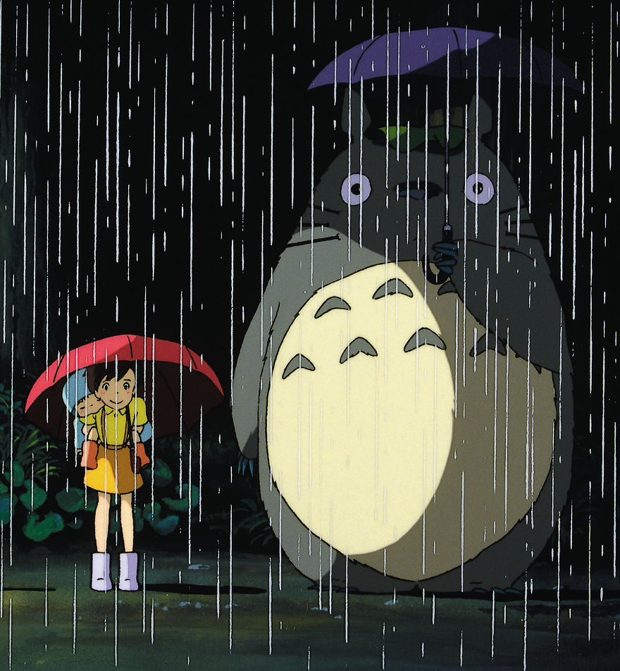 Studio Ghibli character under an umbrella in the rain, a charming scene capturing whimsical animation style.