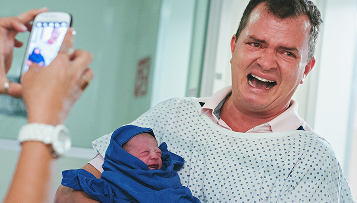 Father Meetings His Newborn Child